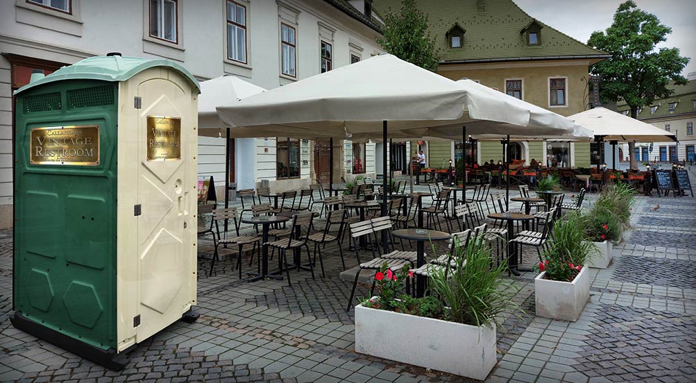 The VINTAGE Portable Restroom for Long Term Rental; Shown at a Restaurant's Outdoor Seating