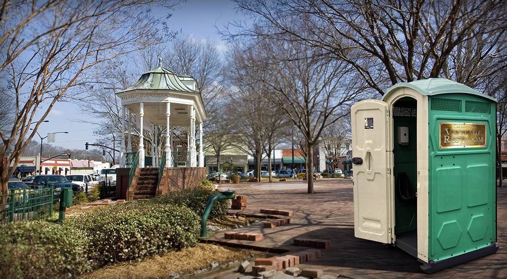The VINTAGE Portable Toilet at a Town Square Park