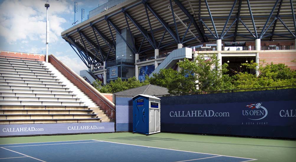 The Blue And White Construction Flush Portable Toilet Near Sporting Event