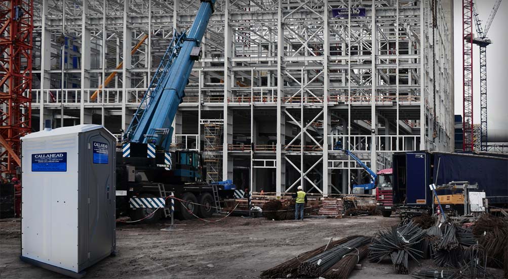 The Construction Wash and Flush Portable Toilet By Construction Site