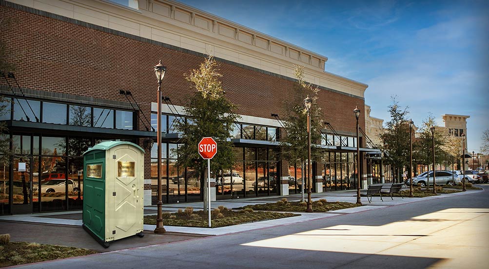 The VINTAGE Portable Restroom Rental at a Commercial Location on Long Island