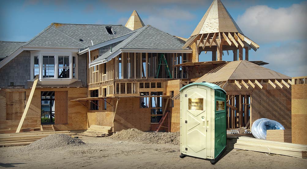 The VINTAGE Portable Bathroom at a Large Home Construction Site