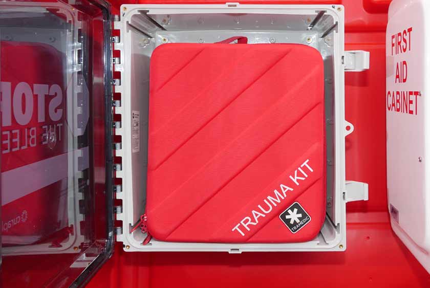 TRAUMA KIT INSIDE PROTECTIVE CABINET