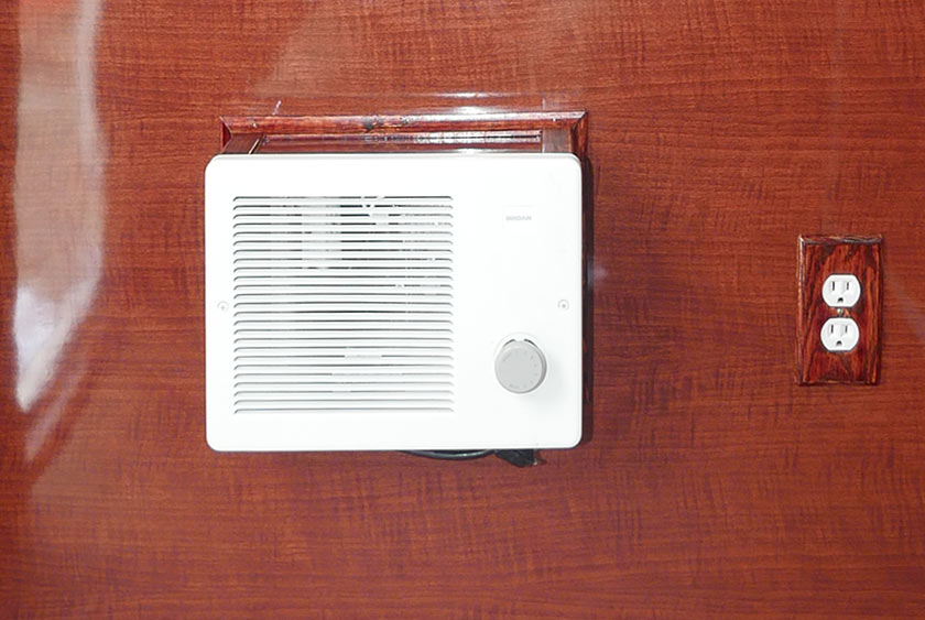 1500 WATT FAN FORCED BROAN HEATER FOR COMFORT, ALONGSIDE DUPLEX OUTLET