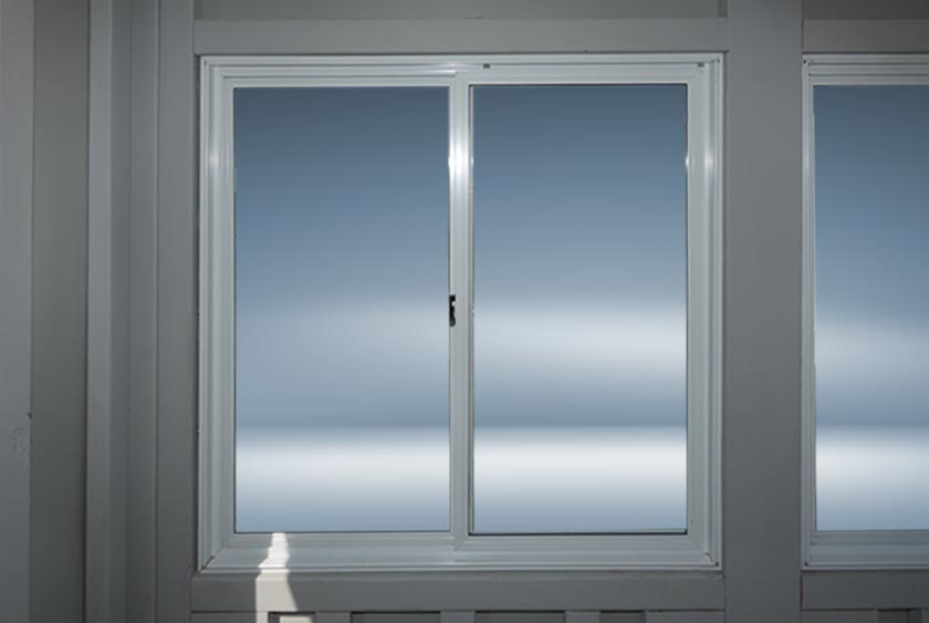 SLIDING GLASS WINDOWS PROVIDE AMPLE NATURAL LIGHT