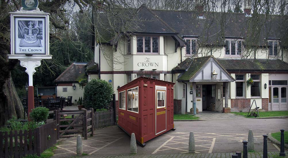 A Red Valet Key Booth 48 in Front of a Bed and Breakfast in New York