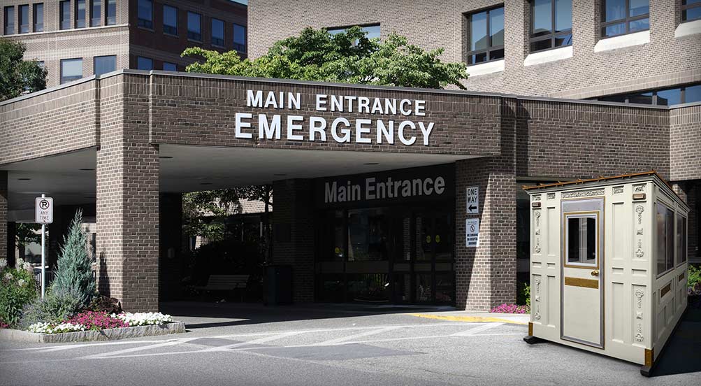 A White Valet Key Booth 48 in Front of a Hospital Main Entrance