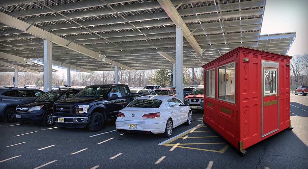 A Red Valet Key Booth 48 in a Covered Outdoor Parking Lot
