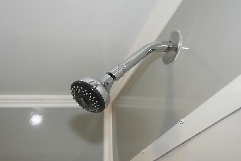 OVER-SIZED SHOWER HEAD IN EACH SHOWER STALL