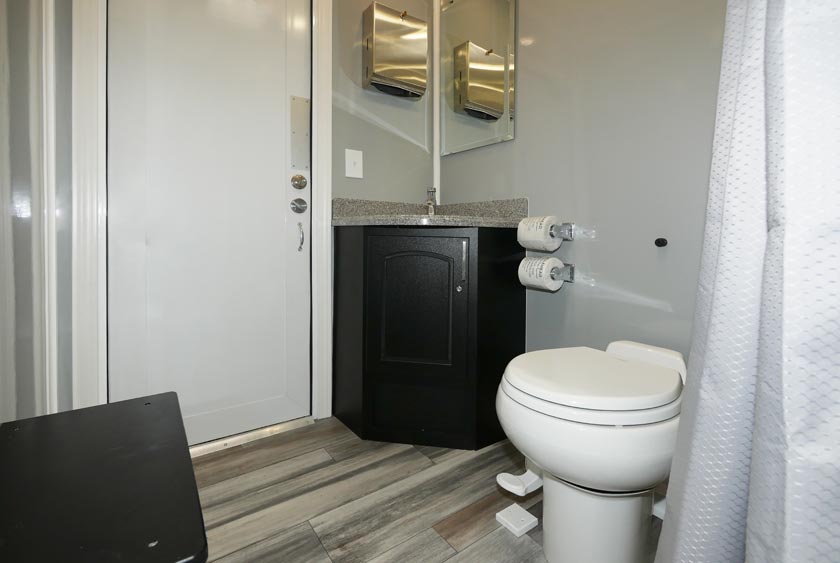FULL SERVICE BATHROOM INSIDE SHOWER TRAILER