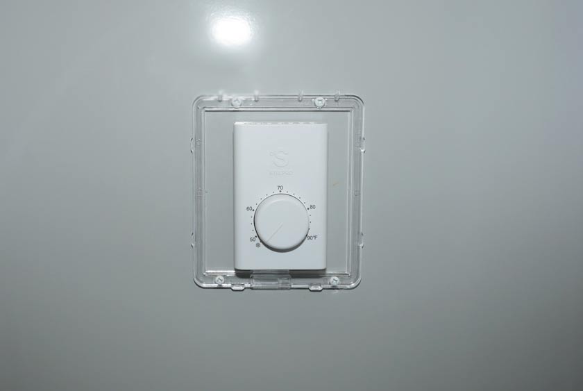 THERMOSTAT CONTROLLED HEAT AND AIR CONDITIONING