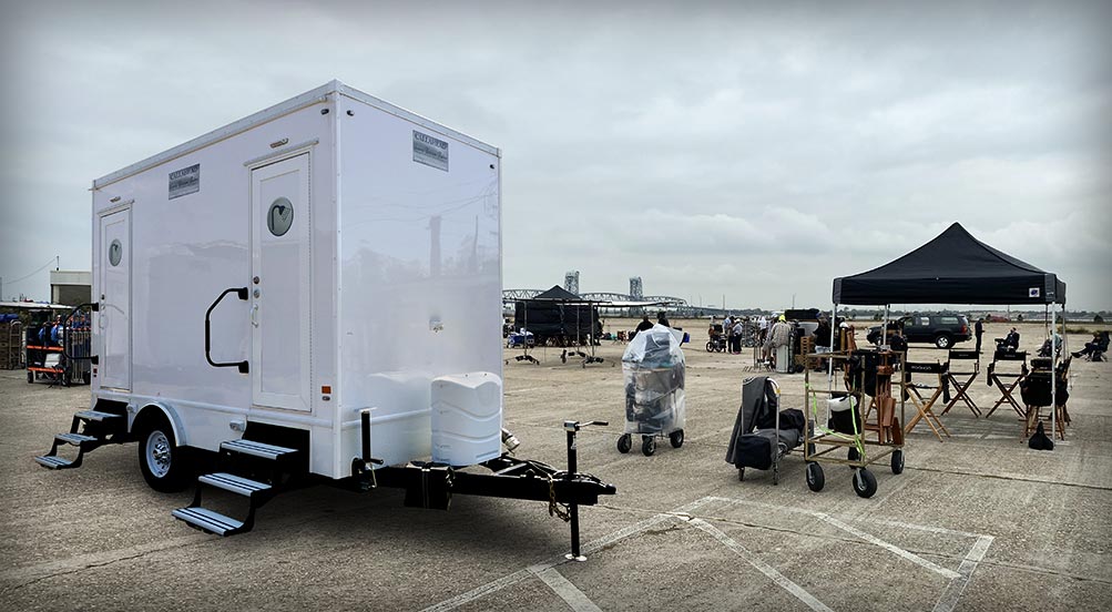 Fresh Pour Shower Trailer Near parking Lot