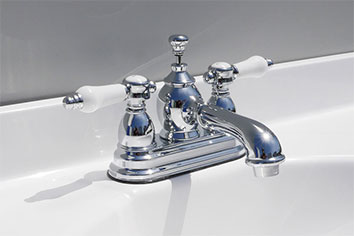 Stainless faucet with dual porcelain handles