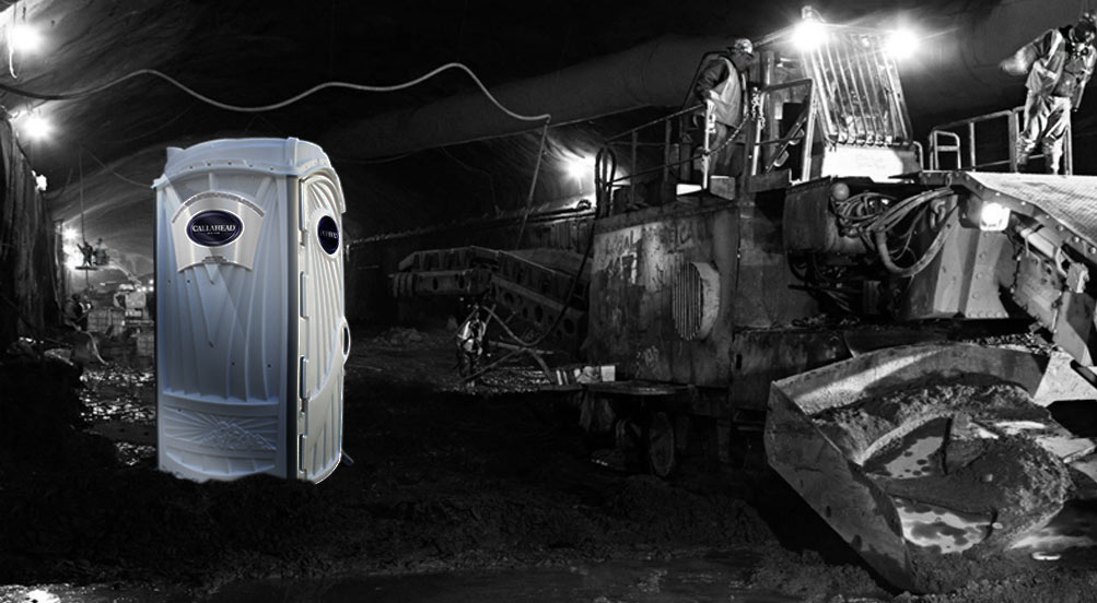 A White Toilet Portable Restroom In A Underground Tunnel