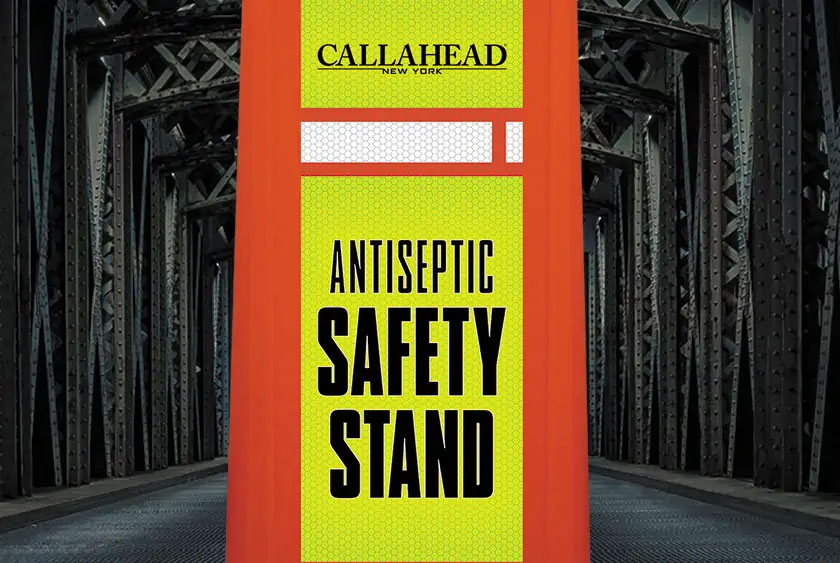 FLUORESCENT ORANGE, YELLOW AND WHITE SIGNAGE MATCHES SAFETY EQUIPMENT