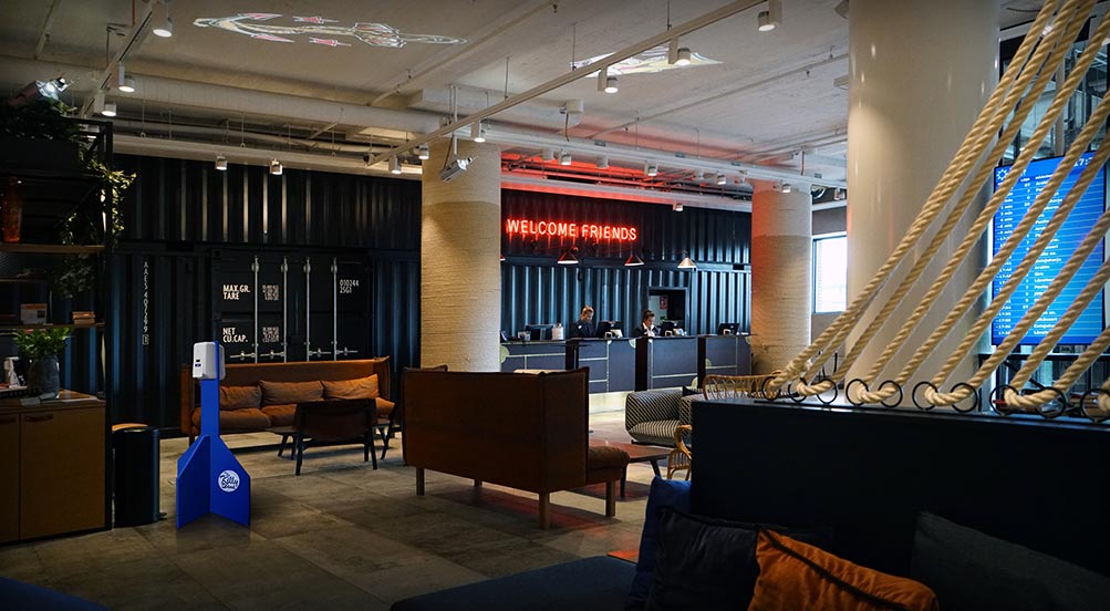 killy stand inside a high end restaurant entrance