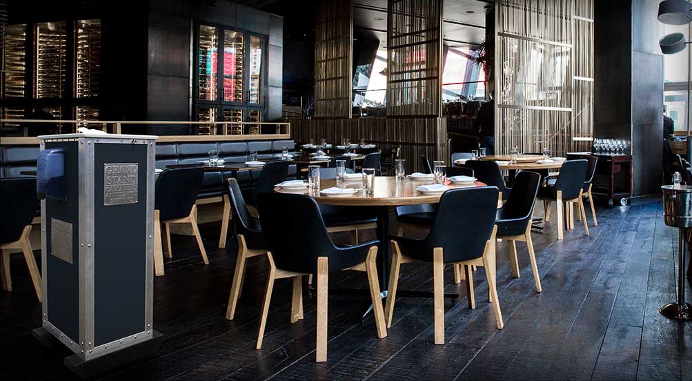 The Grand Stand Hand Sanitizing Near Outdoor Restaurants