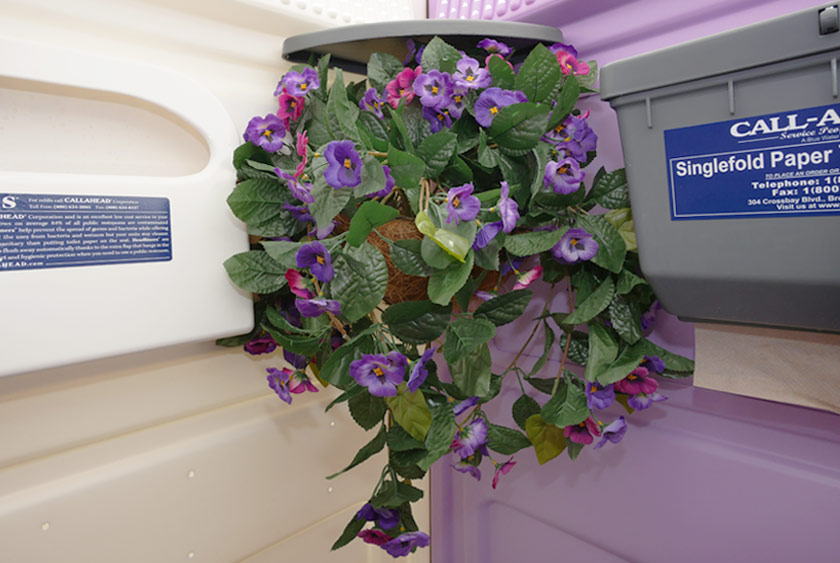 SILK FLOWER ARRANGEMENT adds a touch of class and elegance to the restroom