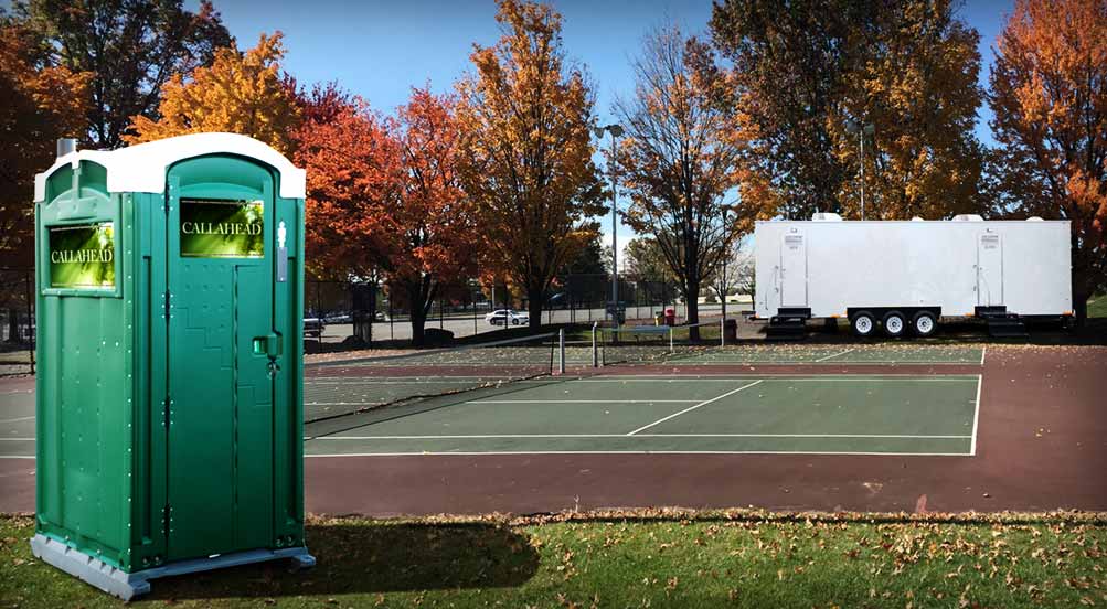 THE GREEN HEAD PORTABLE TOILET Near Tennis Court