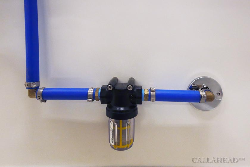 WATER FILTER AT INLET TO SINK, TOILET AND URINAL