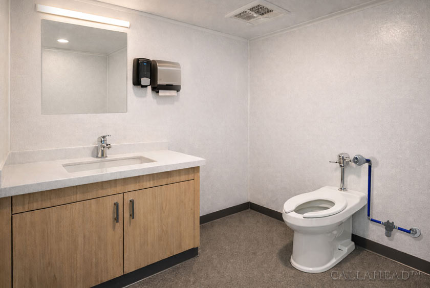 DOTCOMM RESTROOM INSIDE OFFICE TRAILER AT A CONSTRUCTION SITE