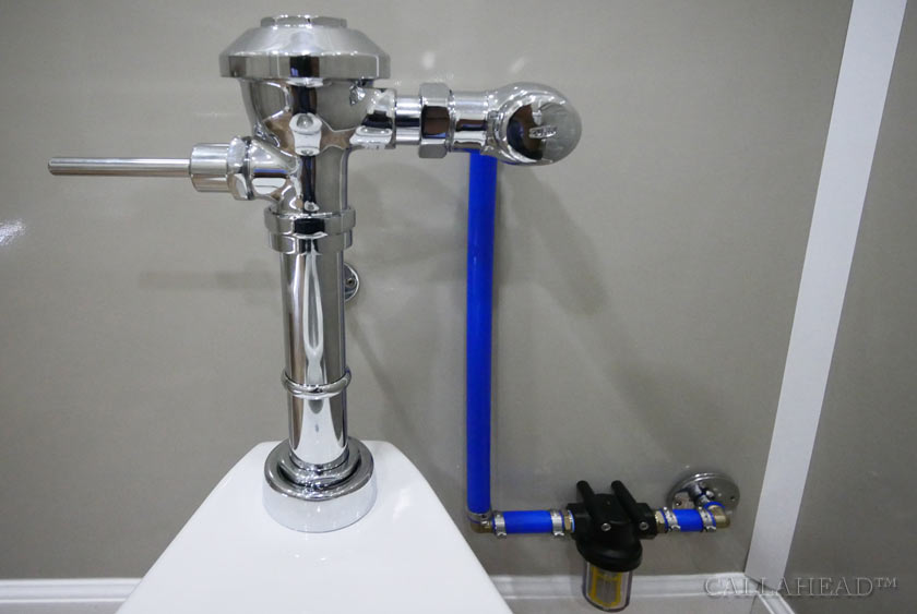 THE FLUSHOMETER USES DIRECT WATER PRESSURE RATED AT 50 LBS.