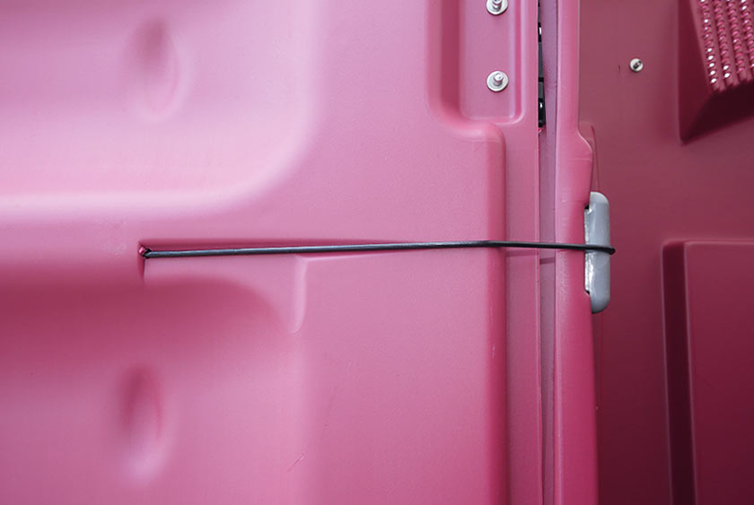 SPRING LOADED DOOR CLOSES AUTOMATICALLY