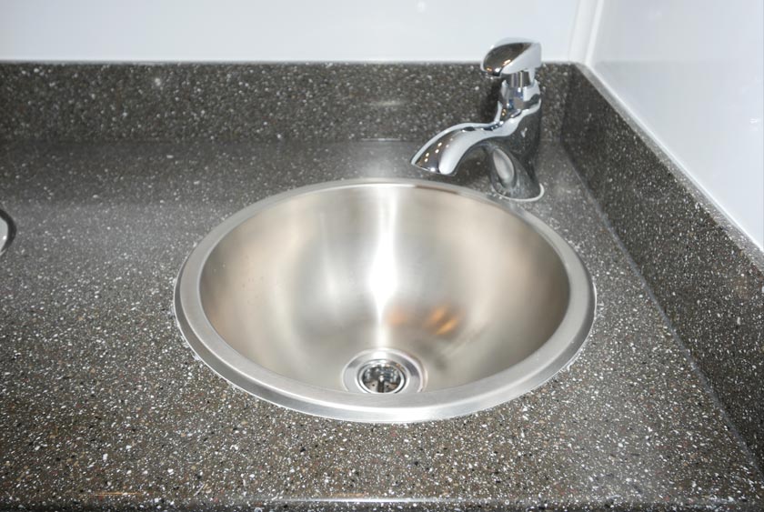 STAINLESS STEEL SINK WITH AUTO SHUTOFF FAUCETS