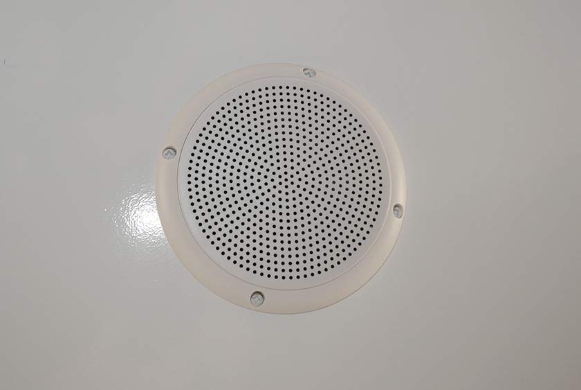 CENTRAL MUSIC SYSTEM WITH CEILING MOUNTED SPEAKERS