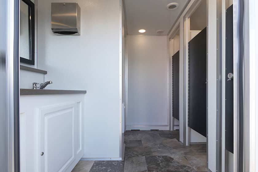 THE BAYSIDE RESTROOM TRAILER WOMEN'S ENTRANCE