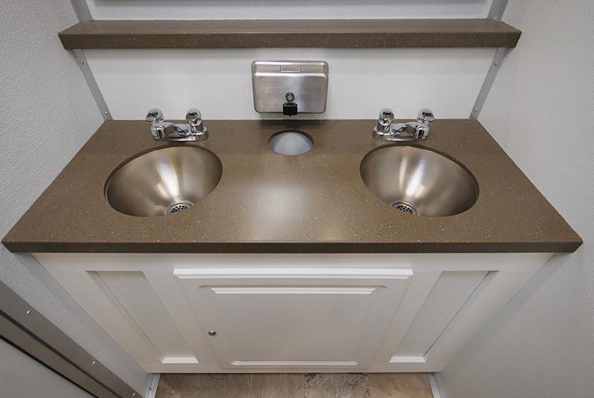 CORIAN VANITY COUNTERTOPS CAN HANDLE HEAVY USAGE