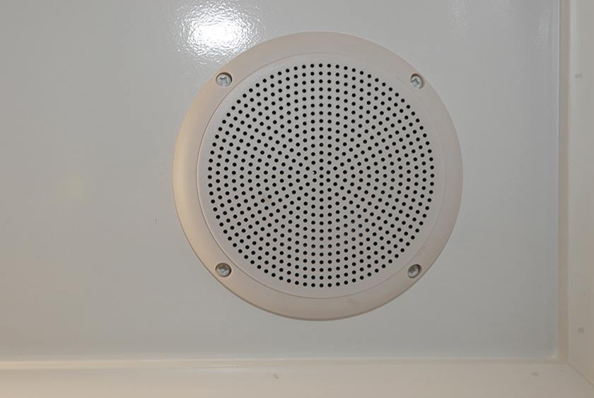 CENTRAL AM/FM/CD STEREO SYSTEM WITH CEILING MOUNTED SPEAKERS