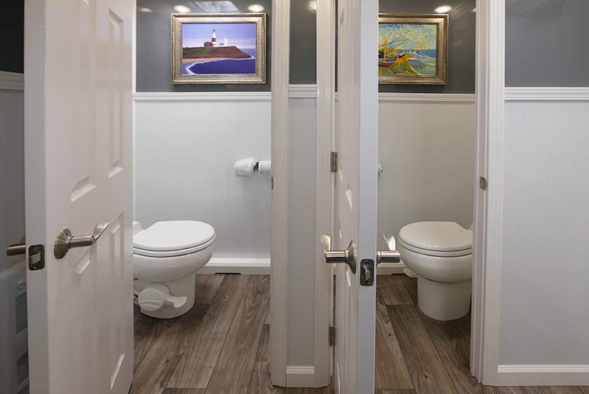 PRIVATE TOILET STALLS WITH FLOOR TO CEILING LOCKABLE DOORS