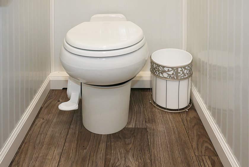 FULL SIZED PORCELAIN TOILETS WITH FOOT PEDAL FLUSH SYSTEM