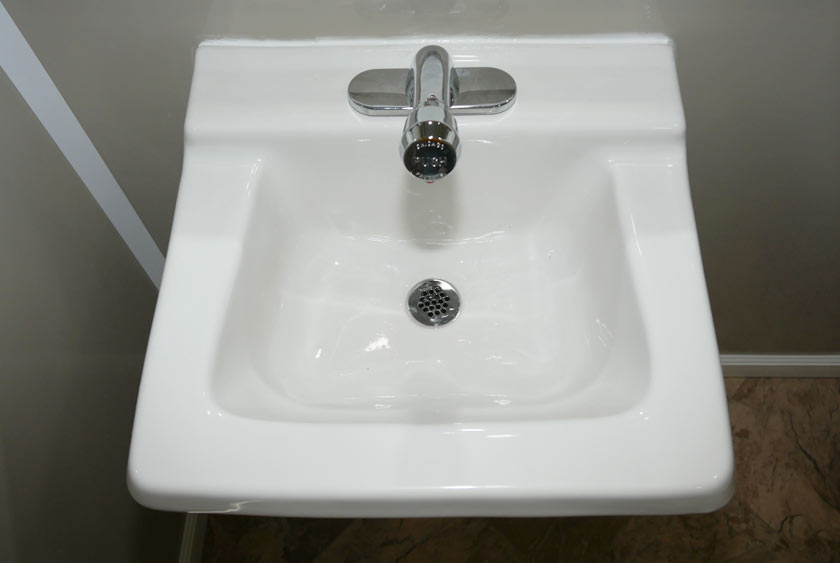 PORCELAIN WALL HUNG SINK WITH EASY ACCESS HOT AND COLD WATER FAUCET