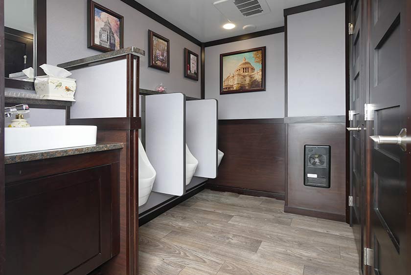 MEN'S ROOM ENTRANCE TO THE HYDE PARK LUXURY RESTROOM TRAILER