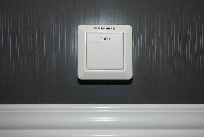 PUSH BUTTON FLUSHING SYSTEM