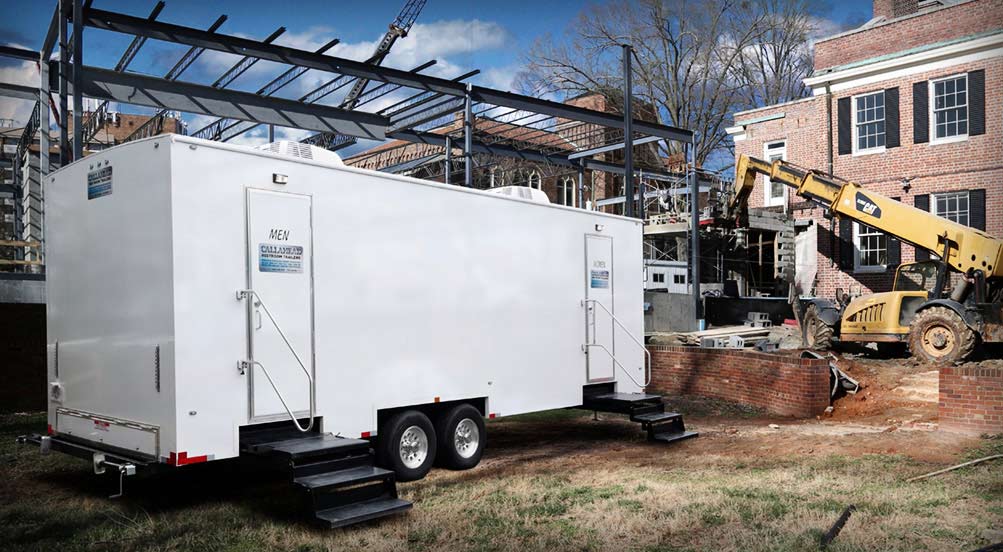 The PLANDOME Restroom Trailer In The Yard 