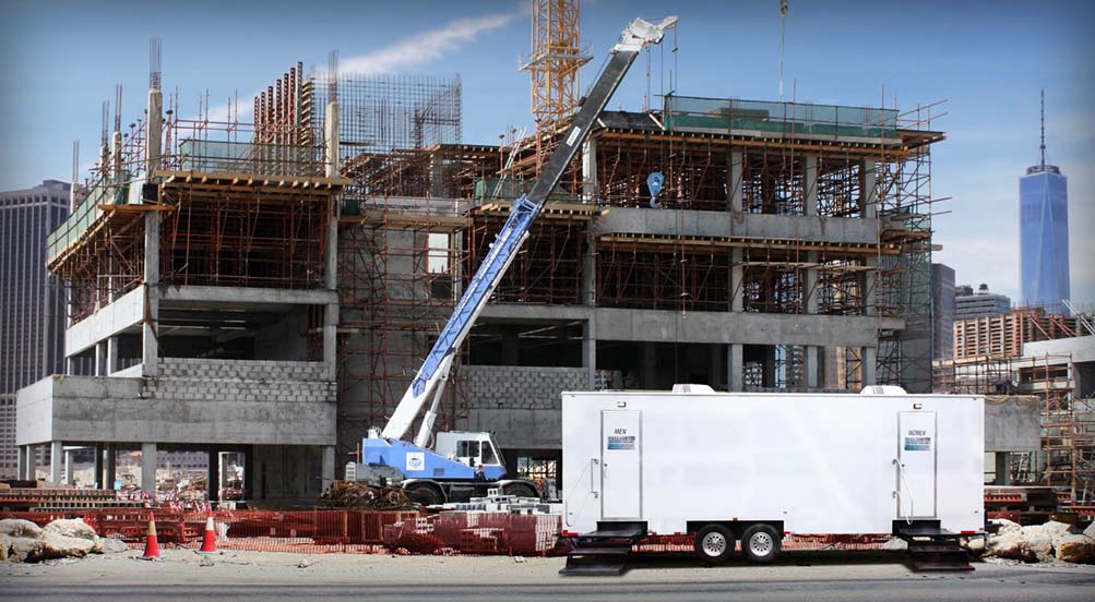 The PLANDOME Restroom Trailer At A Job site