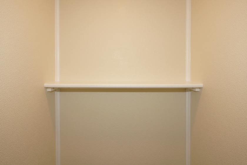 CONVENIENCE SHELVES INSIDE BATHROOM STALLS