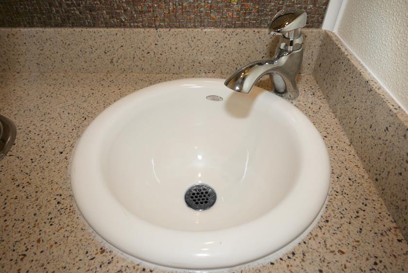 PORCELAIN SINKS AND CORIAN COUNTERTOPS