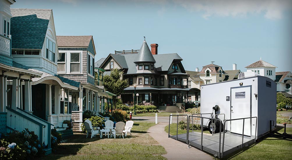 The Single ADA Restroom Trailer Near A Residential Area 