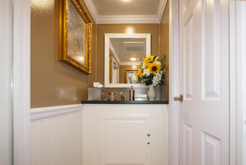 COMFORTABLE SPACE WITH FLOOR TO CEILING LOCKING TOILET STALLS