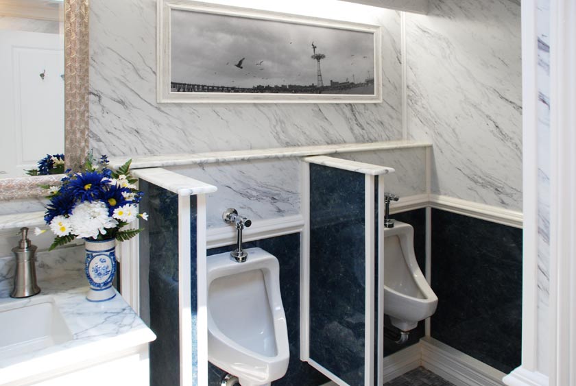 TWO PORCELAIN URINALS ON MEN'S SIDE