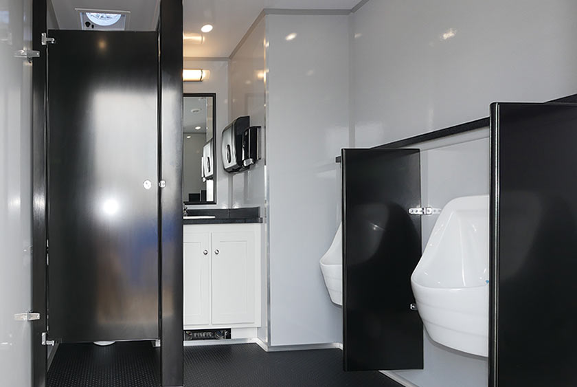 MEN'S ENTRANCE TO THE CONCOURSE RESTROOM TRAILER