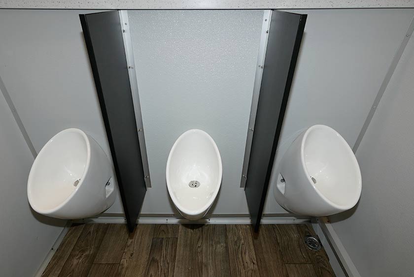 THREE PORCELAIN URINALS FOR MEN