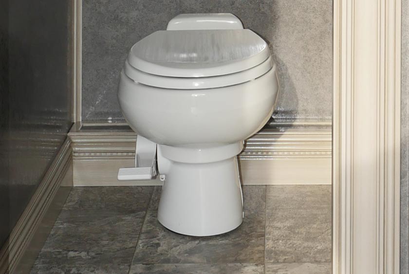 PEDDLE FLUSH PORCELAIN TOILETS