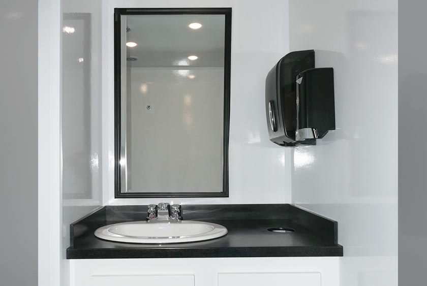 VANITY AREAS INCLUDE LARGE MIRRORS