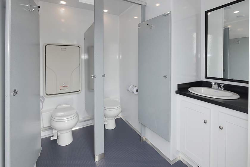 WOMEN'S ENTRANCE TO THE GRANITE RESTROOM TRAILER