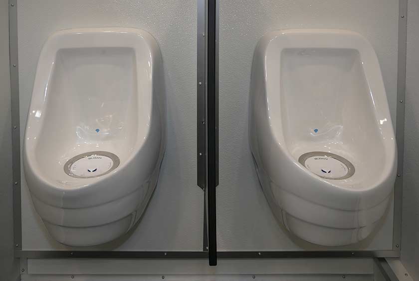 ODORLESS PORCELAIN URINALS ON THE MEN'S SIDE